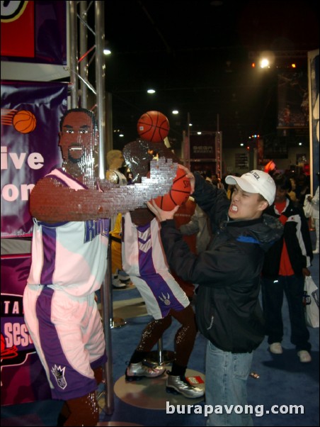 Trying to steal the ball from Chris Webber.