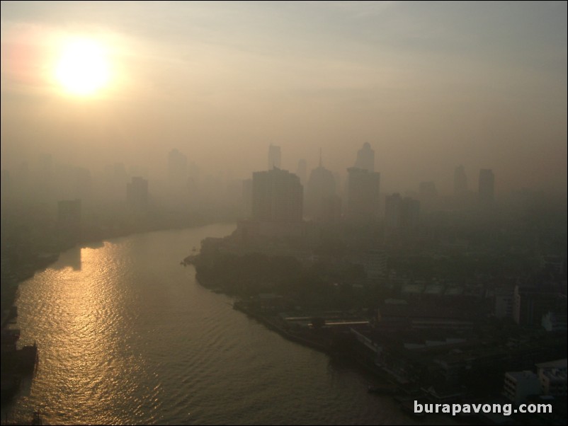 Early morning skyline views of Bangkok from Samphanthawong. Chao Phraya River below.