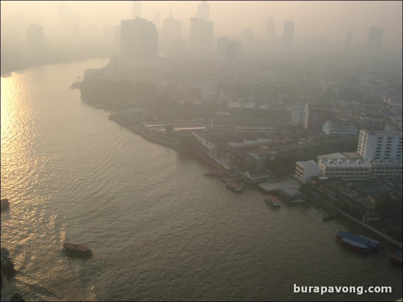 Early morning skyline views of Bangkok from Samphanthawong. Chao Phraya River below.