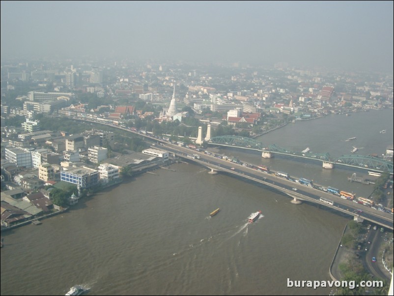 Early morning skyline views of Bangkok from Samphanthawong. Chao Phraya River below.