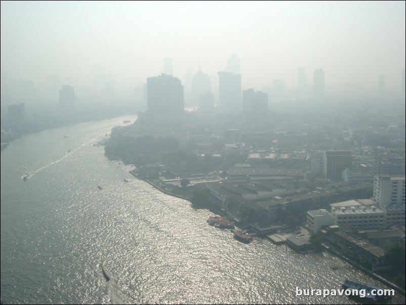 Early morning skyline views of Bangkok from Samphanthawong. Chao Phraya River below.