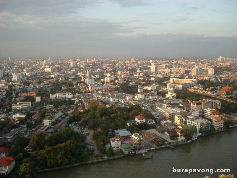 Aerial views of Bangkok from Samphanthawong. Chao Phraya River below.