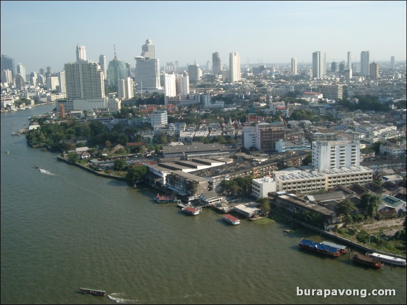 Aerial views of Bangkok from Samphanthawong. Chao Phraya River below.