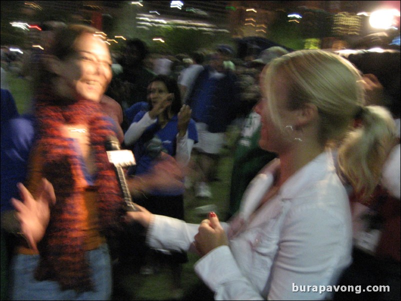 Orlando-Gainesville news reporter interviewing Gator fans after the game.