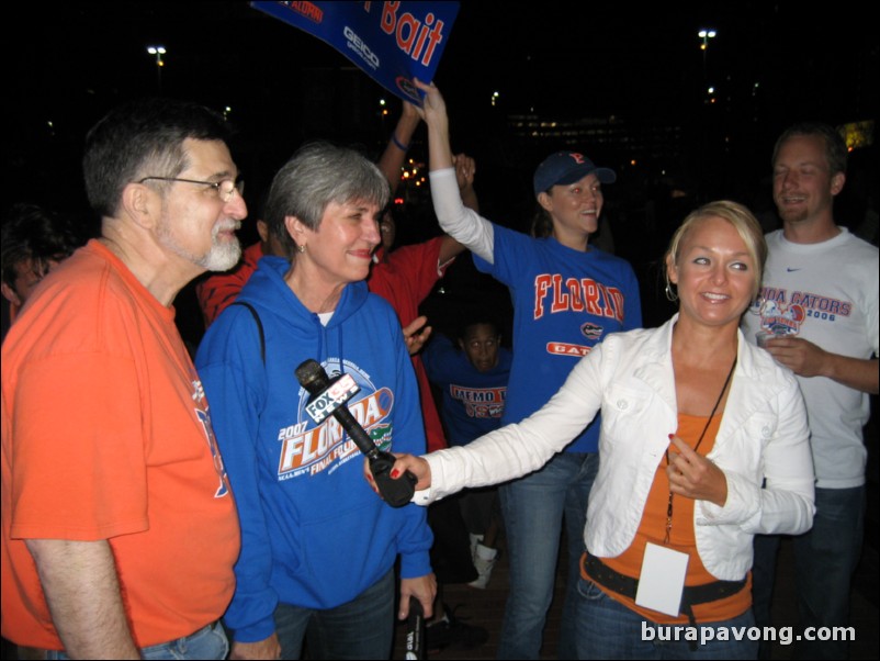 Orlando-Gainesville news reporter interviewing Gator fans after the game.