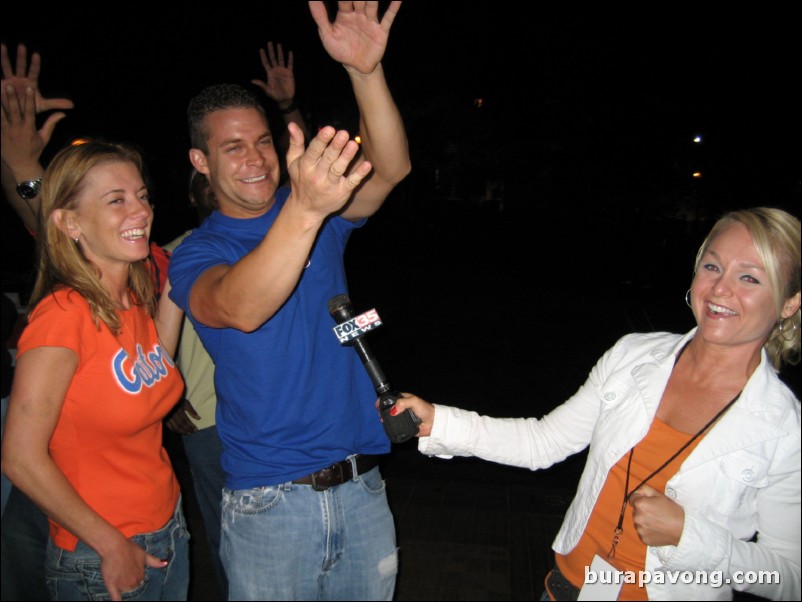 Orlando-Gainesville news reporter interviewing Gator fans after the game.