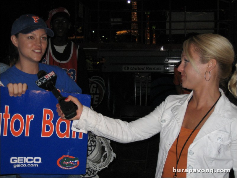 Orlando-Gainesville news reporter interviewing Gator fans after the game.