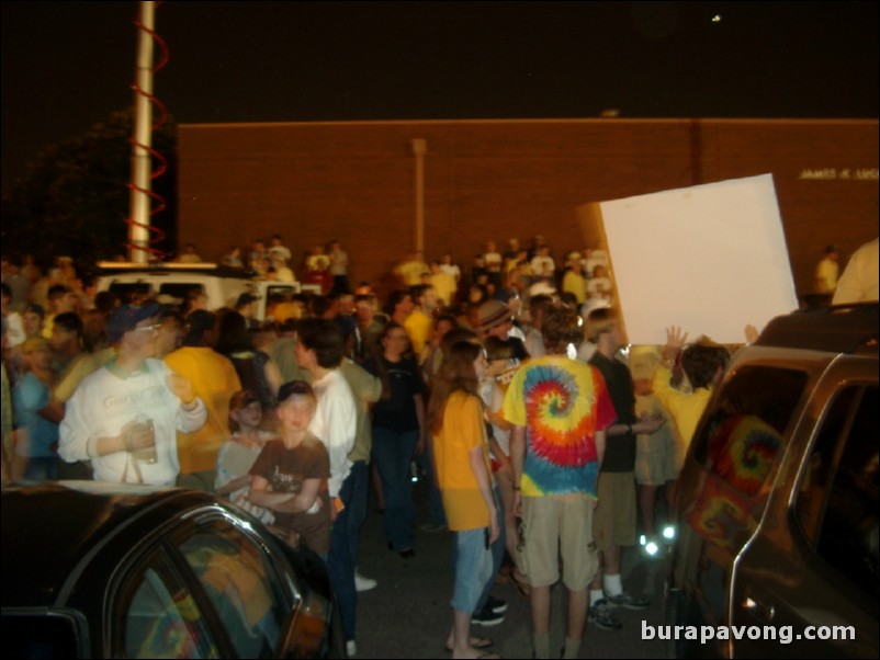 Georgia Tech students, alumni, and fans gather outside Alexander Memorial Coliseum.