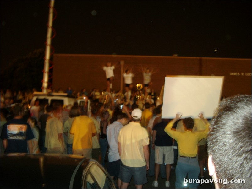 Georgia Tech students, alumni, and fans gather outside Alexander Memorial Coliseum.