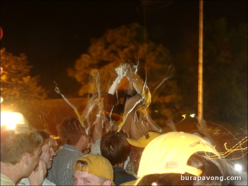 Georgia Tech students, alumni, and fans gather outside Alexander Memorial Coliseum.