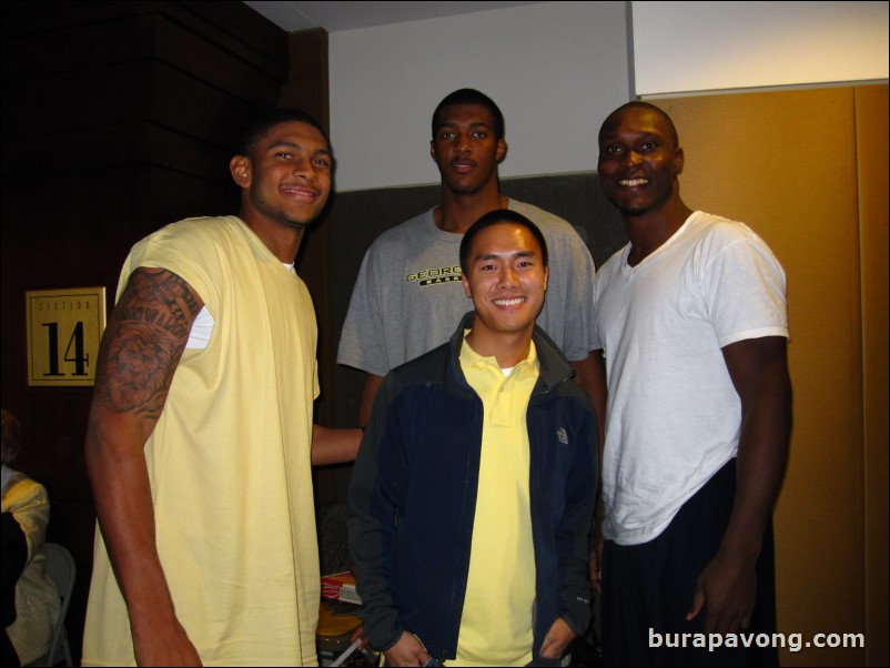 Lance Storrs, Derrick Favors, and D'Andre Bell.