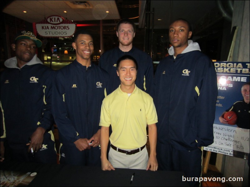 Nate Hicks (center) and Kammeon Holsey (right).