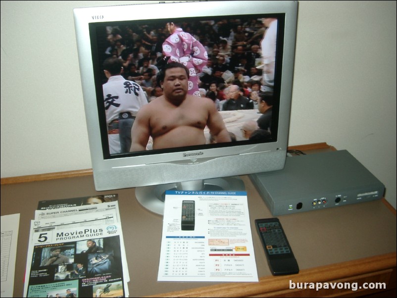 Live sumo wrestling on TV.