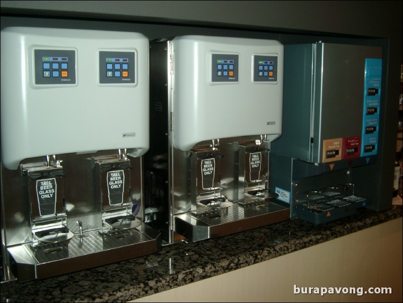 Beer and beverage machines at the bar.