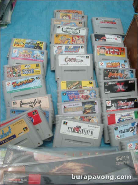 Old Super Famicom games at a flea market in Rinku Town.