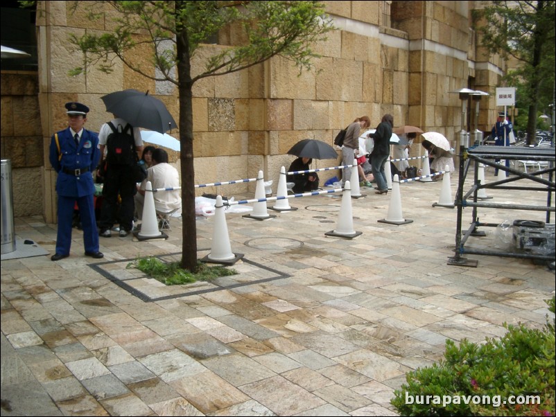 People starting to camp out for some event, Roppongi Hills Arena.