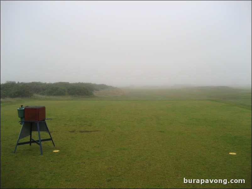 Early morning fog off the first tee.