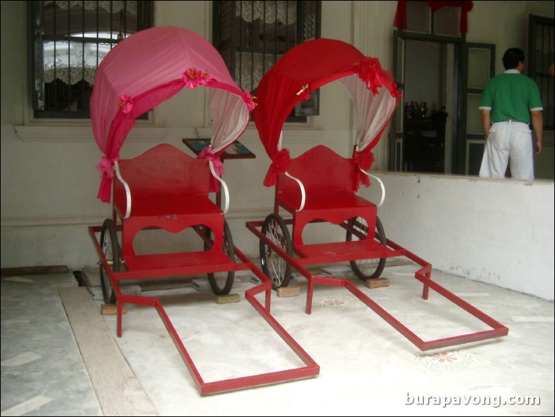 Old Chinese rickshaws at Pithak Chinpracha House Museum.